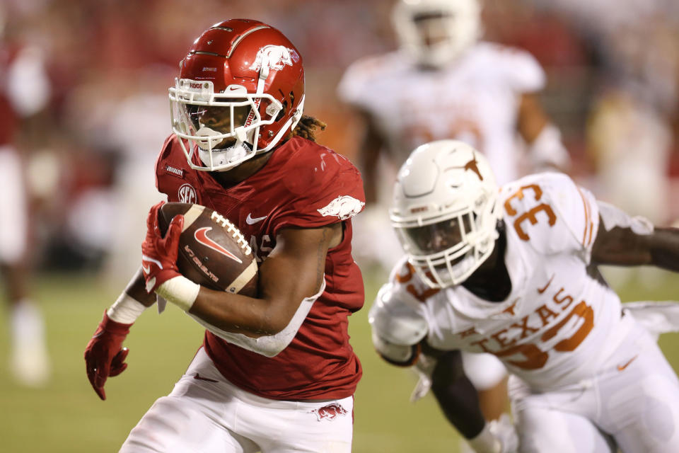 Sep 11, 2021; Fayetteville, Arkansas, USA; Arkansas Razorbacks running back AJ Green (0) rushes for a touchdown in the second half against the Texas Longhorns at Donald W. Reynolds Razorback Stadium. Arkansas won 40-21. Mandatory Credit: Nelson Chenault-USA TODAY Sports