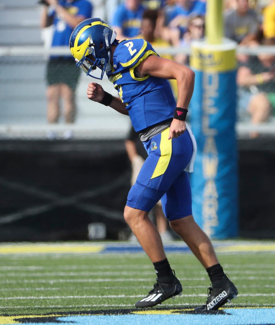 Delaware quarterback Nolan Henderson comes off the field after getting shaken up on a sack against Albany in the second quarter at Delaware Stadium, Saturday, Oct. 2, 2021. He did not play in the remainder of the half.