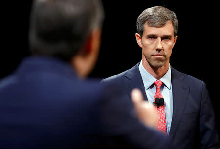 FILE PHOTO: Rep. Beto O'Rourke (D-TX) looks on as he listens to Sen. Ted Cruz (R-TX) during a debate for Texas U.S. Senate seat at the Southern Methodist University in Dallas, Texas, U.S., September 21, 2018. Tom Fox/The Dallas Morning News/Pool via REUTERS/File Photo NO RESALES. MANDATORY CREDIT.