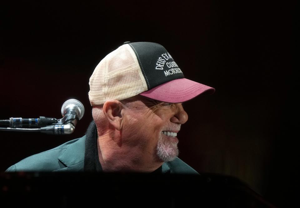 Billy Joel, pictured here performing at Chase Field on Dec. 8, 2023, will play Tampa's Raymond James Stadium on Feb. 24.