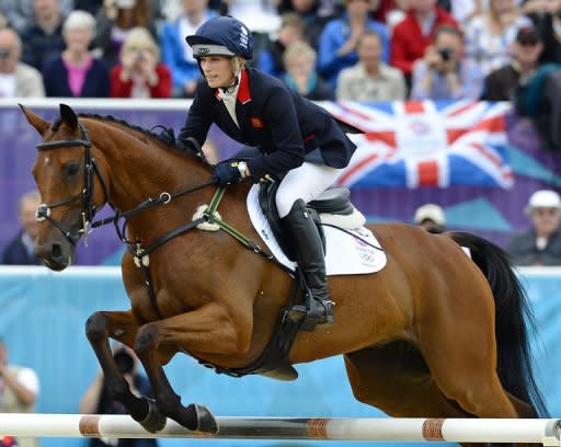 Great Britain finished second in the three-day eventing on Tuesday to earn a silver medal for Queen Elizabeth II's granddaughter Zara Phillips, with Germany taking the top spot and New Zealand claiming bronze