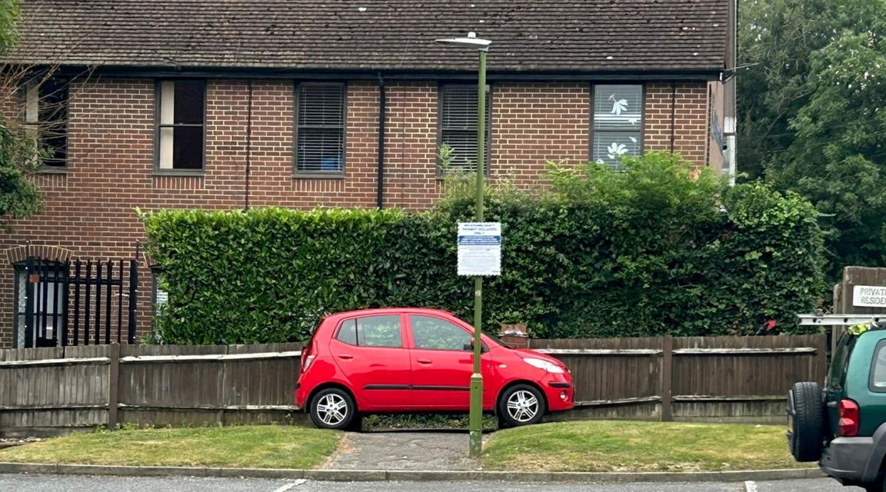 Car blocking the footpath. Photo released September 5 2024. A disgruntled resident has taken to blocking a footpath with their car in a long-running row over primary school parking.A cul-de-sac in Bushey, Hertfordshire, has been in an ongoing feud with parents who use the private road to park when dropping their kids off at school. The Meadowcroft estate just off the high street is connected by a footpath to St Hildaâ€™s Preparatory School, which makes it an ideal spot for parents to park- to the frustration of residents.Around 18 months ago, ANPR cameras were installed to discourage parents parking and Â£100 penalty charges started appearing in the post.
