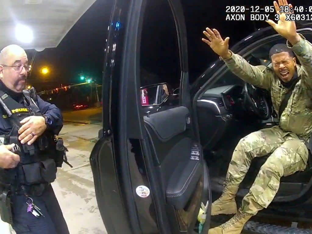 Caron Nazario exits his vehicle after being sprayed with a chemical agent by officer Joe Gutierrez during a violent traffic stop in Windsor, Virginia, U.S., December 5, 2020. (via REUTERS)