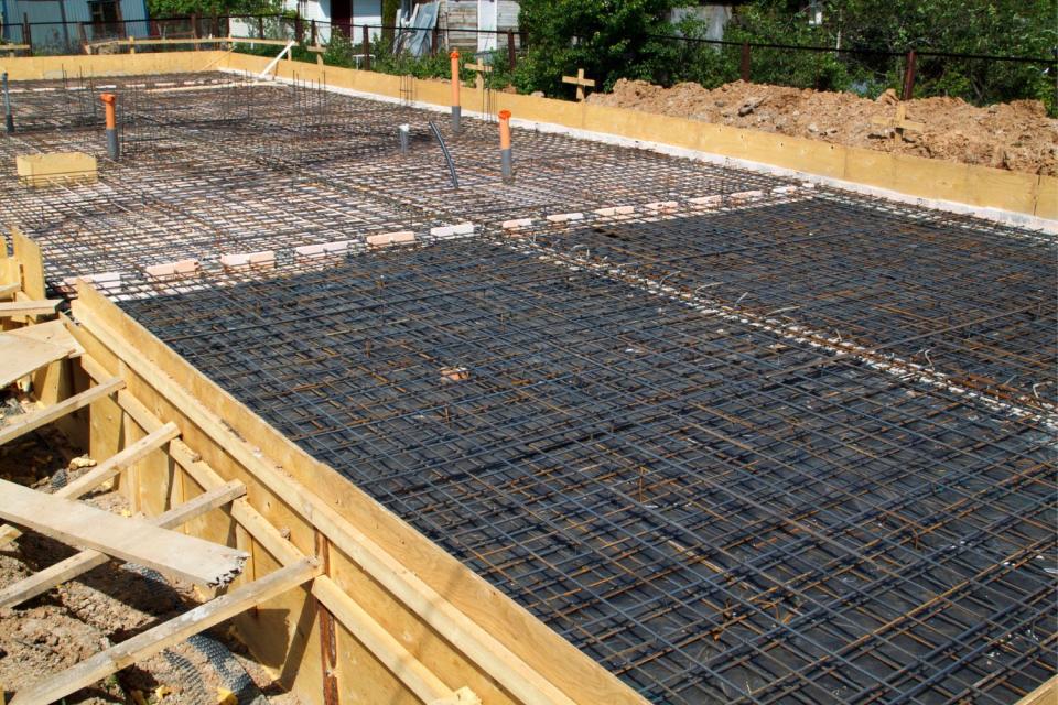 A close up of a foundation in the process of being built.