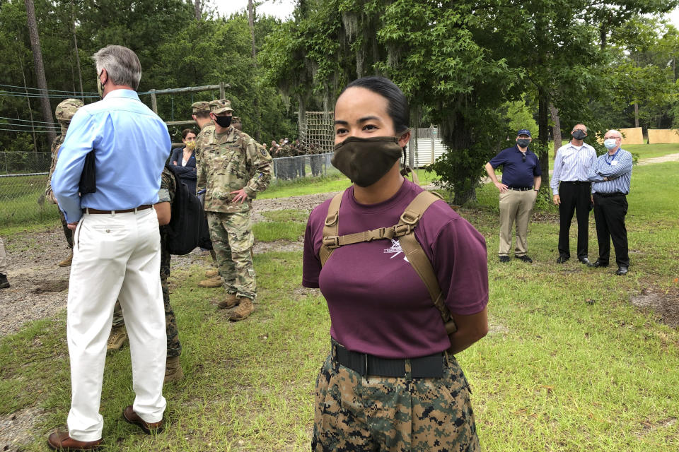 Staff Sgt. Katheryn Hunter, a Marine drill instructor at Parris Island Recruit Depot in South Carolina, poses for a photo on May 27, 2020. In ways big and small, the virus is impacting training at the Marine Corps' Parris Island Recruit Depot and across the military. Hunter, a drill instructor for three years at Parris Island, said the main difference she sees due to the virus is that the number of female recruits she has in 4th Battalion, Oscar Company, has dropped to 70.(AP Photo/Lolita Baldor)