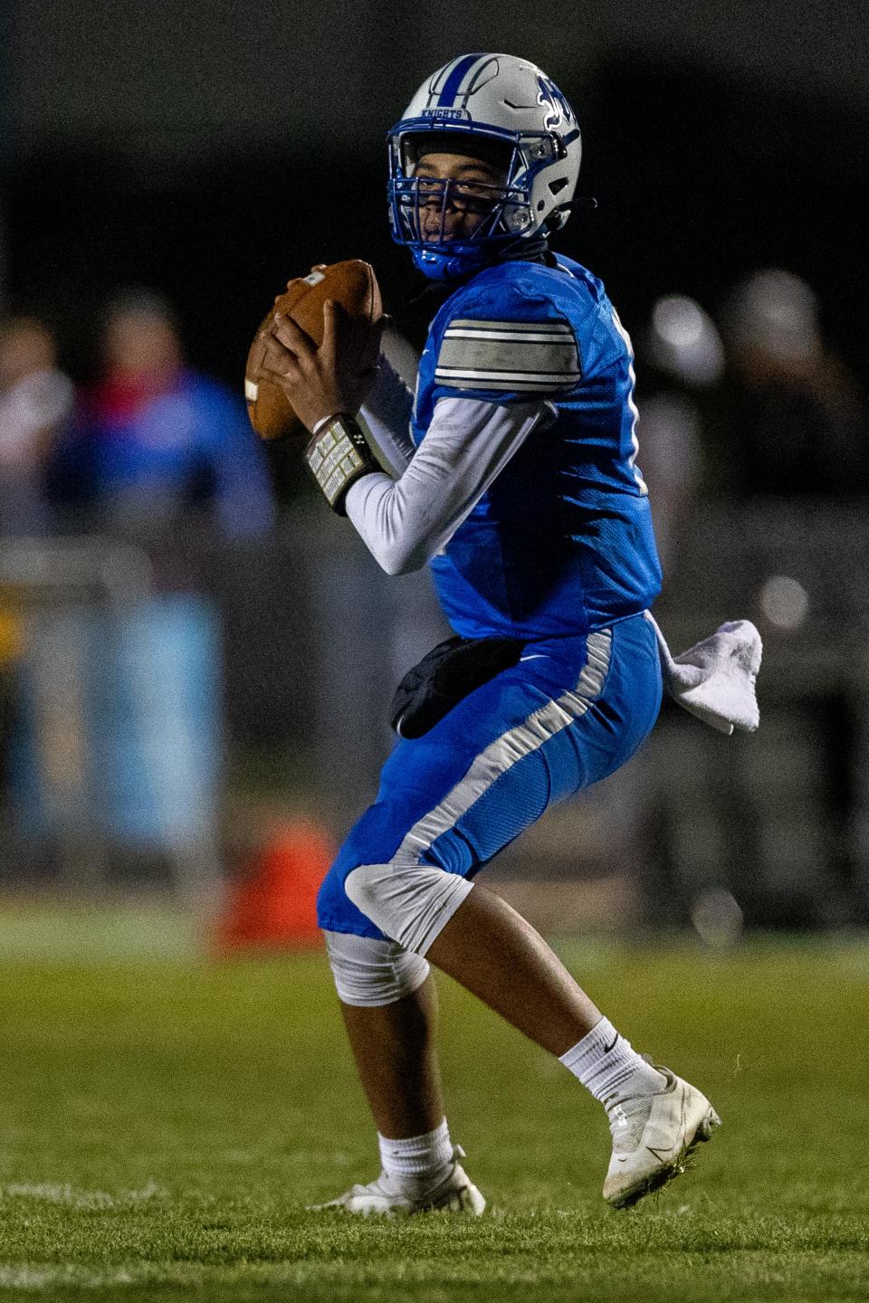 Marian’s Bryce LaSane passes the ball during the Brebeuf Jesuit-Marian semistate high school football game on Friday, November 19, 2021, at Bob Otolski Field in Mishawaka, Indiana.