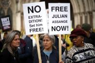 Supporters of Wikileaks founder Julian Assange protest in London