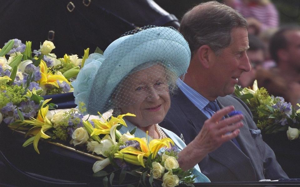 The Queen Mother in her carriage, celebrating her 100th birthday, accompanied by Prince Charles - IAN JONES