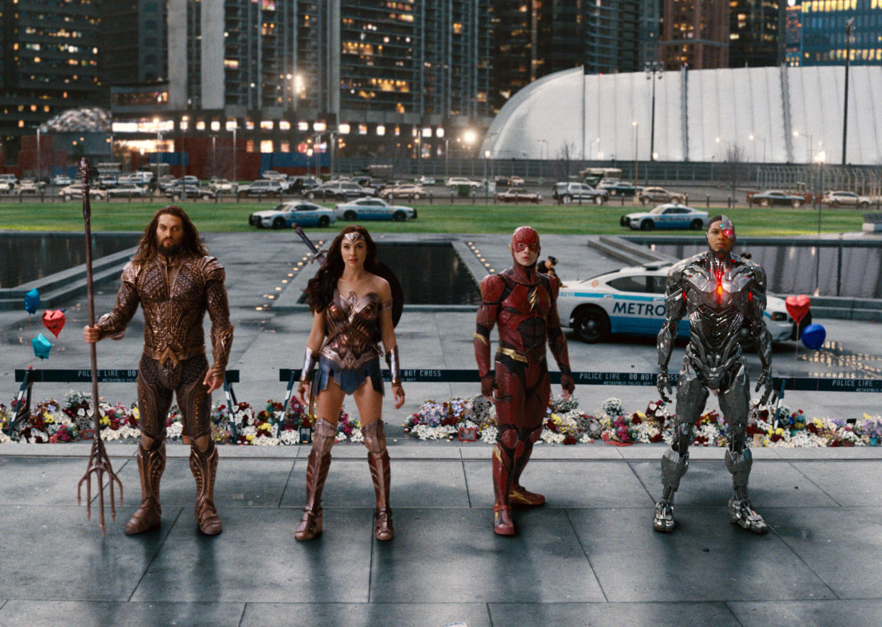 Jason Momoa (Aquaman), Gal Gadot (Wonder Woman), Ezra Miller (Flash), and Ray Fisher (Cyborg) in <em>Justice League.</em> (Photo: Warner Bros.)