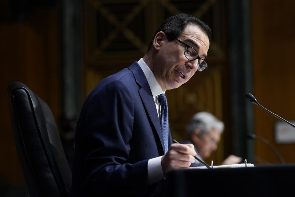 Treasury Secretary Steven Mnuchin testifies during a Senate Banking Committee hearing on 'The Quarterly CARES Act Report to Congress' on Capitol Hill in Washington, Tuesday, Dec. 1, 2020. (AP Photo/Susan Walsh, Pool)