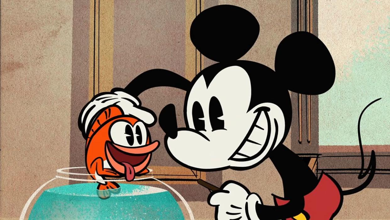  Mickey Mouse and pet fish 