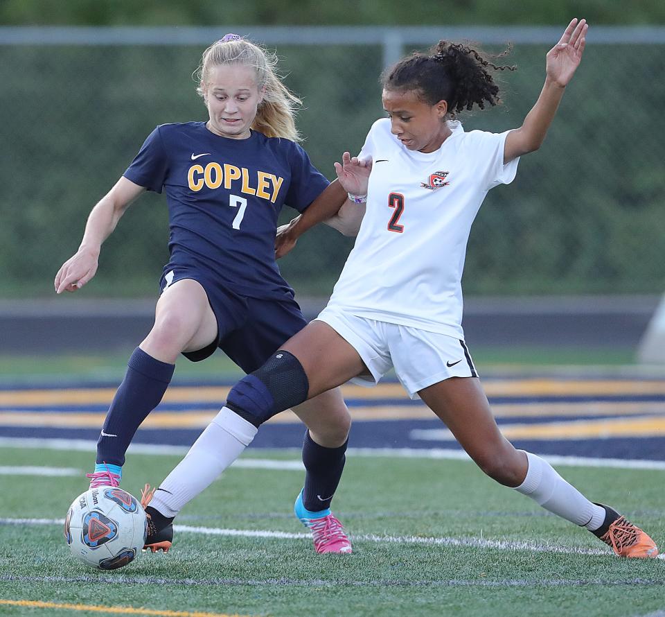 Copley's Emma Stansky, left, and Green's Jillian Taylor look to gain control of the ball during the first half on Monday, Sept. 12, 2022 in Copley.