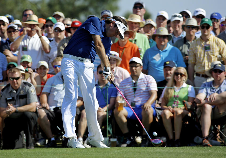 Bubba Watson tees off on the eighth hole during the third round of the Masters golf tournament Saturday, April 12, 2014, in Augusta, Ga. (AP Photo/David J. Phillip)