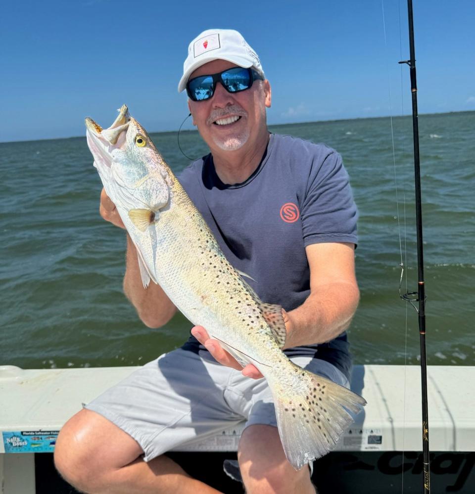 Rick Suarez, from Miami, was fishing the Oak Hill area with Art Mowery when he caught several nice fish, including this beautiful trout. This one went for a croaker, Art says.