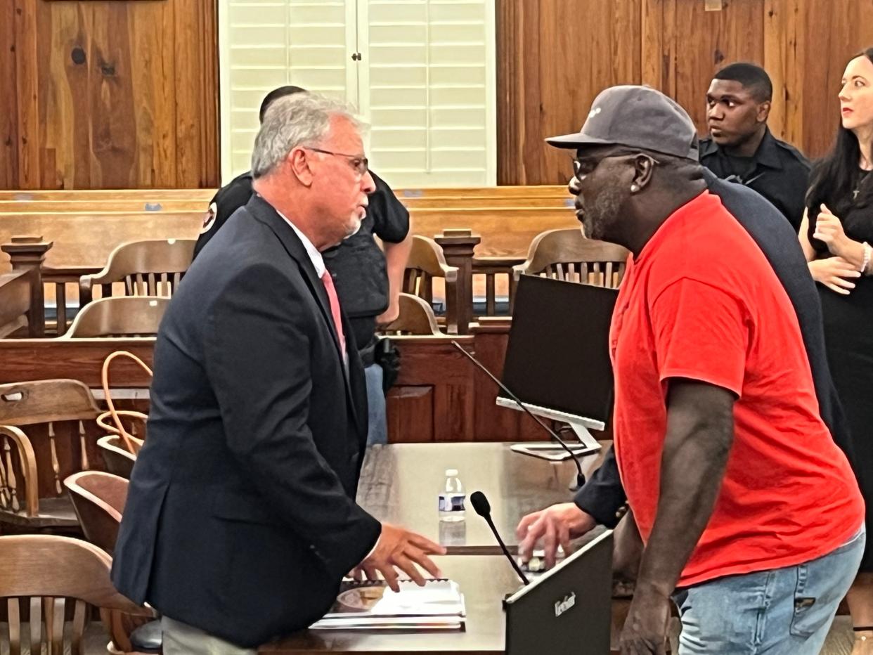 Hog Hammock resident and Sapelo Island descendant Maurice Bailey talks with McIntosh County Commission Chairman David Stevens following the County Commission meeting on Tuesday, September 12, 2023 at the County Courthouse in Darien, Georgia. Stevens was one of 3 commissioners to vote for an amendment that will allow for larger homes to be built in the historic Gullah Geechee community of Hog Hammock on Sapelo Island.