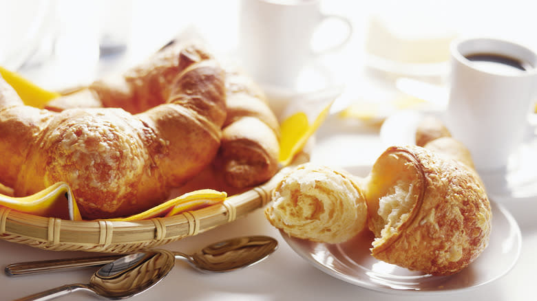 Close-up of breakfast pastries and coffee