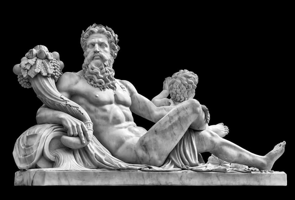 Statue du Dieu grec Zeus avec une corne d’abondance, d’où sort en profusion des fruits et des vivres. <a href="https://www.shutterstock.com/fr/image-photo/marble-statue-greek-god-zeus-cornucopia-459125665" rel="nofollow noopener" target="_blank" data-ylk="slk:Shutterstock;elm:context_link;itc:0;sec:content-canvas" class="link ">Shutterstock</a>