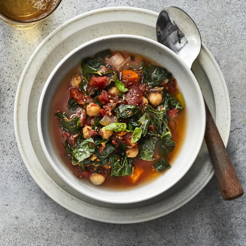 <p>This Mediterranean stew is a healthy dinner chock-full of vegetables and hearty chickpeas. A drizzle of olive oil to finish carries the flavors of this easy vegan crock-pot stew. Swap out the chickpeas for white beans for a different twist, or try collards or spinach in place of the kale. Any way you vary it, this stew is sure to go into heavy rotation when you are looking for healthy crock-pot recipes.</p>