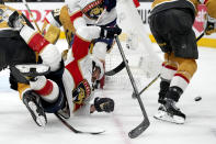 Florida Panthers left wing Ryan Lomberg falls while pursuing the puck against the Vegas Golden Knights during the third period of Game 2 of the NHL hockey Stanley Cup Finals, Monday, June 5, 2023, in Las Vegas. The Golden Knights defeated the Panthers 7-2 to take a 2-0 series lead. (AP Photo/John Locher)