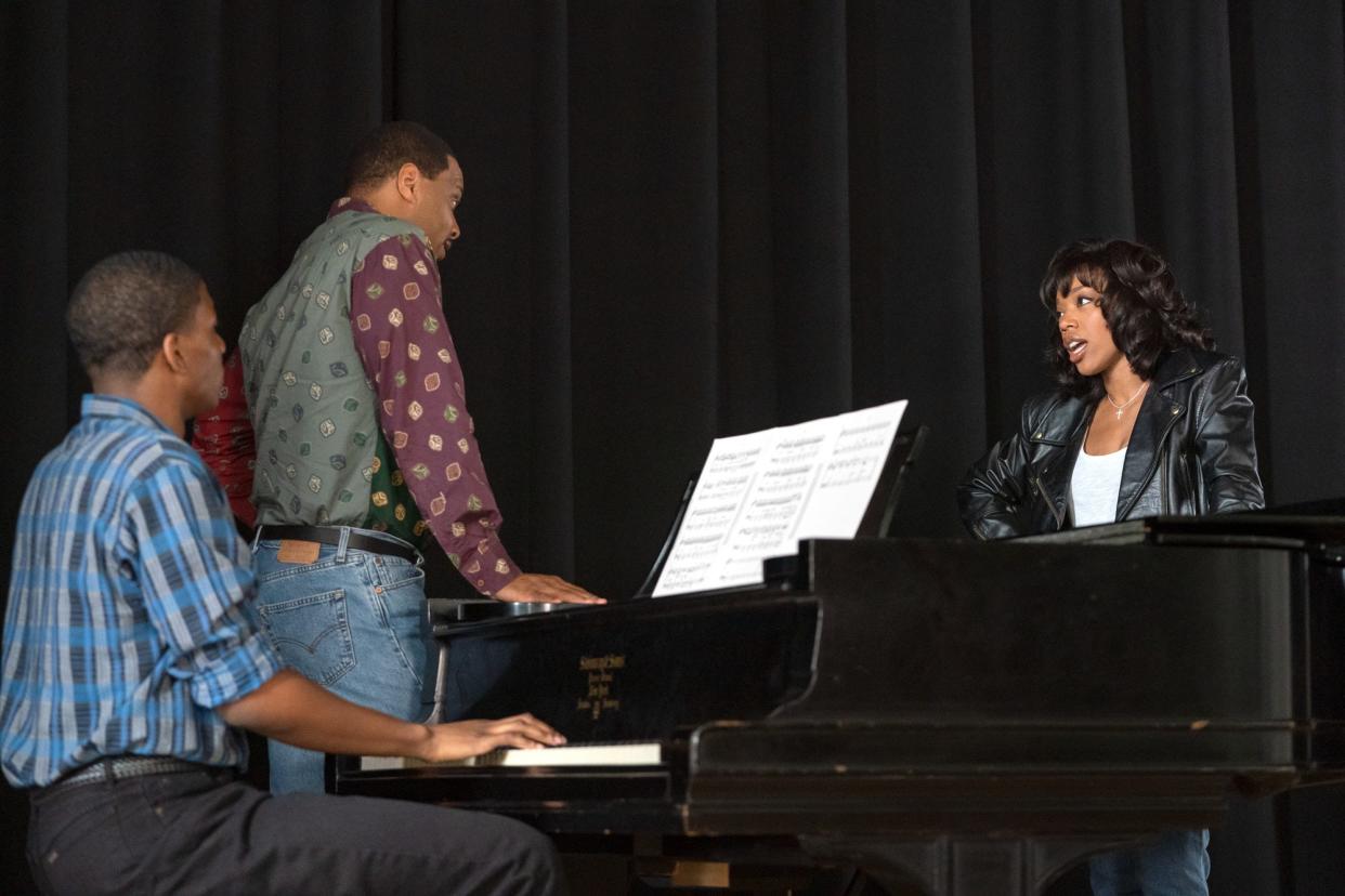 Akron native Kofi Boakye, from left, Dave Heard and Naomi Ackie appear in a scene from Tristar Pictures' "Whitney Houston: I Wanna Dance with Somebody.”