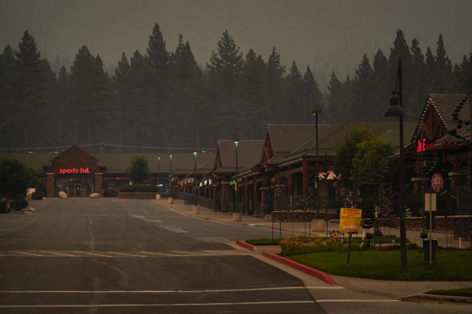 A shopping mall sits empty after people were ordered to evacuate the area due to the Caldor fire.