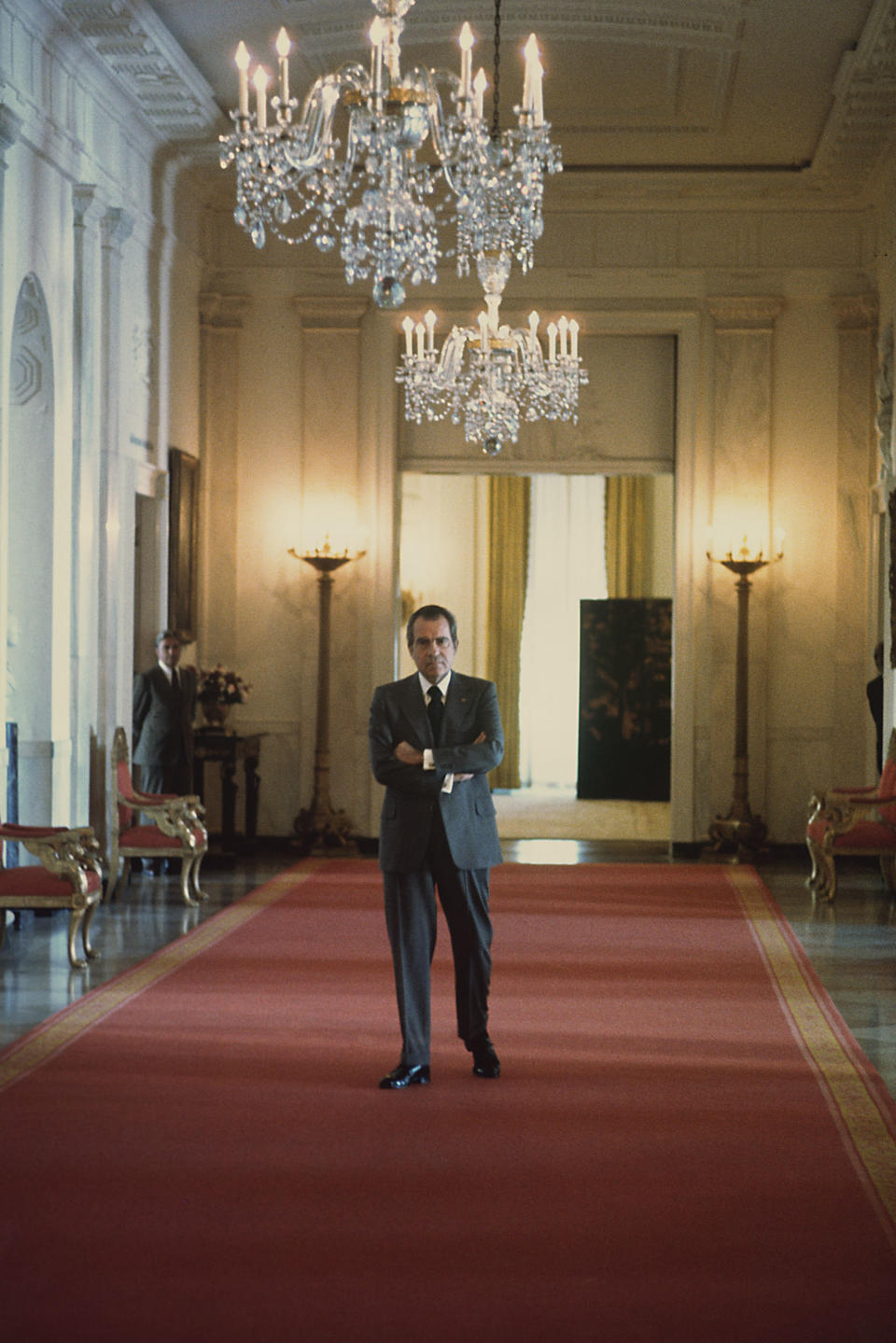 WASHINGTON - JANUARY 1974:  (NO U.S. TABLOID SALES)  U.S. President Richard Nixon waits in the hallway outside the East Room of the White House to give a press conference in January 1974 Washington, DC.  (Photo by David Hume Kennerly/Getty Images)