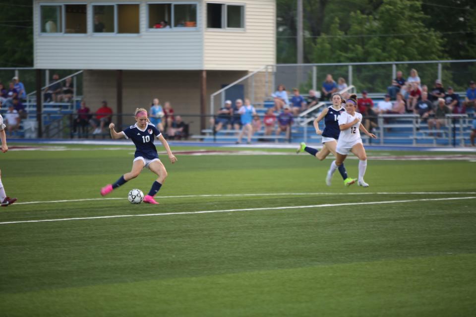 Seaman junior Jaycee Schumann scores a goal against Piper in the first round of regionals.