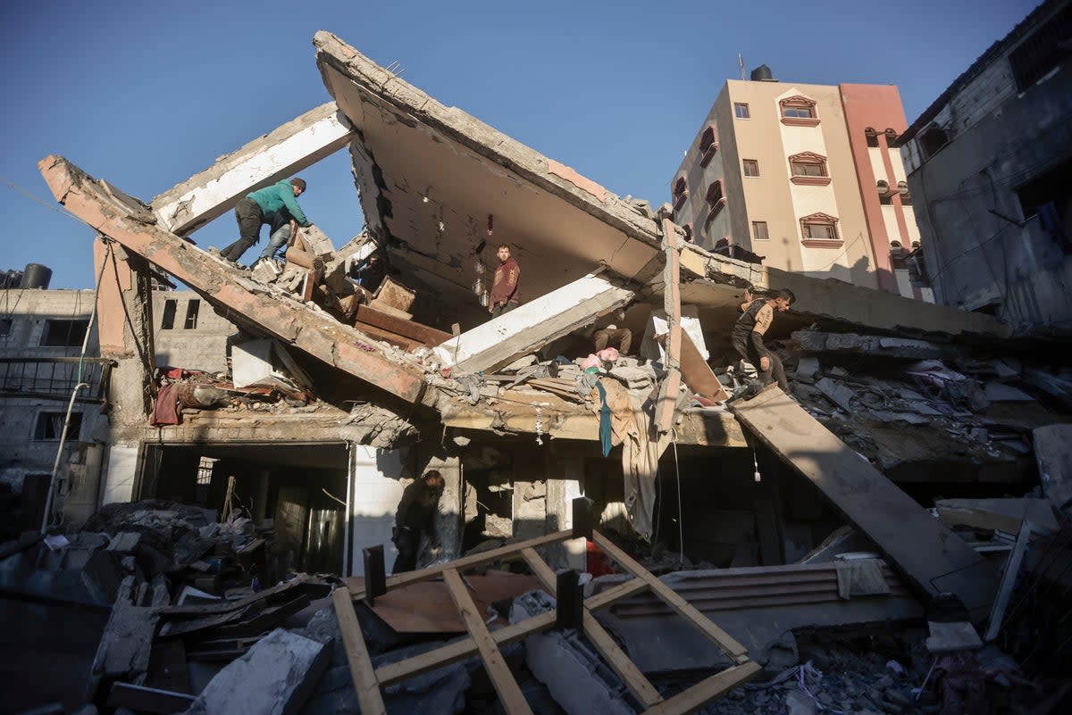 The aftermath of an Israeli strike on Khan Younis, southern Gaza  (AP)