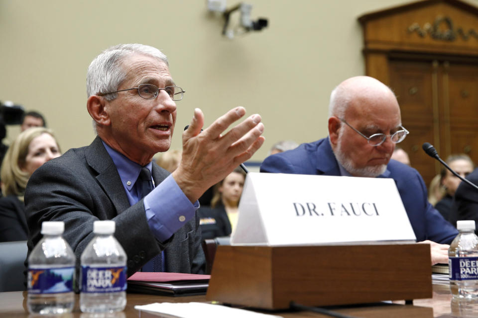 Dr. Anthony Fauci, left, director of the National Institute of Allergy and Infectious Diseases, testifies before a House Oversight Committee hearing on preparedness for and response to the coronavirus outbreak on Capitol Hill in Washington, Wednesday, March 11, 2020. Sitting alongside Fauci is Dr. Robert Redfield, director of the Centers for Disease Control and Prevention. (AP Photo/Patrick Semansky)