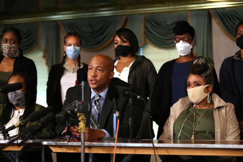 Attorney James Bible flanked by the family of Manuel Ellis and members of the Tacoma Action Collective during a press conference on June 9, 2020.  / Credit: Karen Ducey / Getty Images