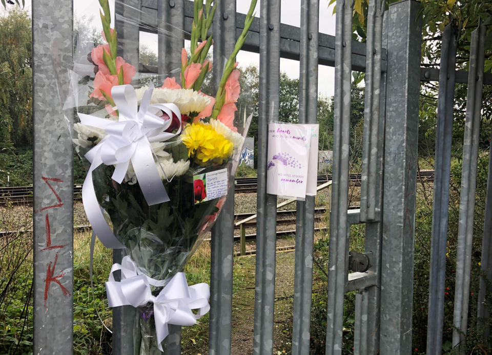 Flowers left at the scene where the boy was killed. (PA)