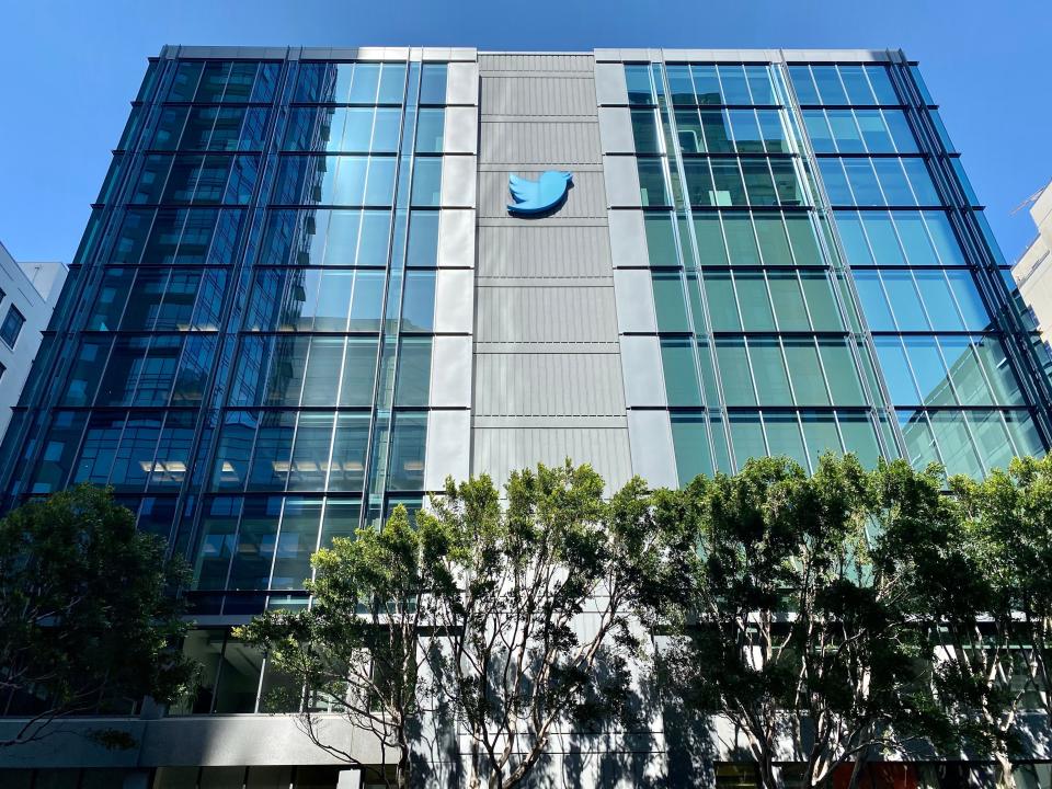 Twitter headquarters in San Francisco off of 10th Street, with trees in the front of the photo