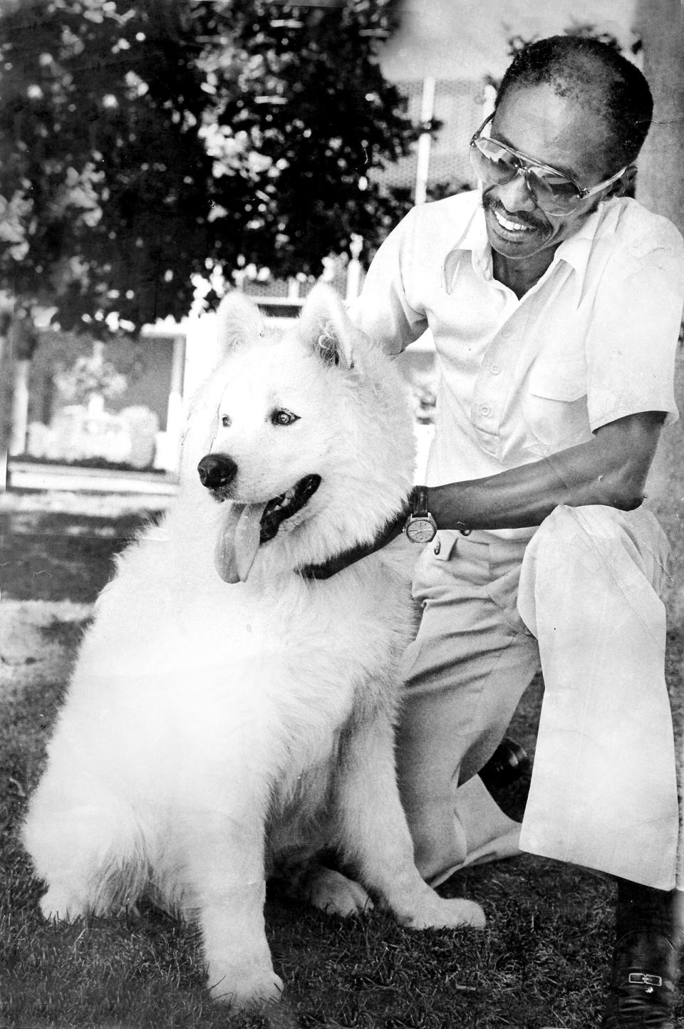 Roy with family dog, Chico, in 1977 for Palo Alto City council flyer