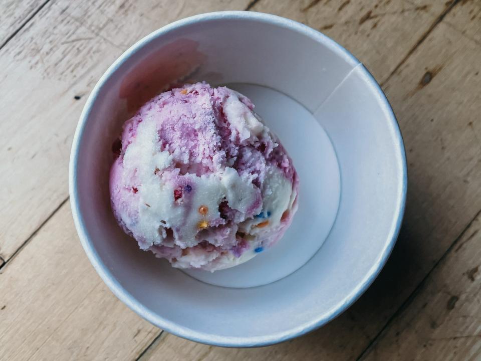 scoop of blossom's berry twirl ice cream from baskin robbins