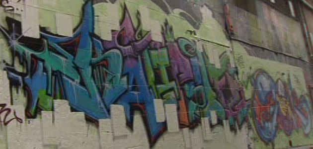 Jill Meagher tribute in Hosier Lane, Melbourne CBD, defaced by graffiti artists. Photo: 7News