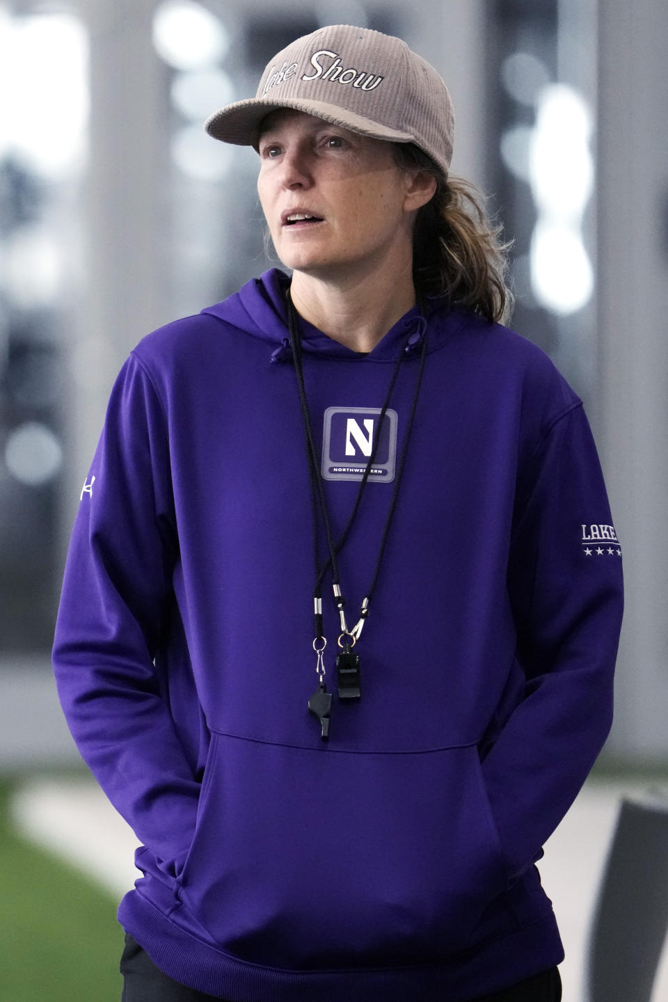 Northwestern women's lacrosse coach Kelly Amonte Hiller watches players during practice in Evanston, Ill., Tuesday, Feb. 6, 2024. (AP Photo/Nam Y. Huh)