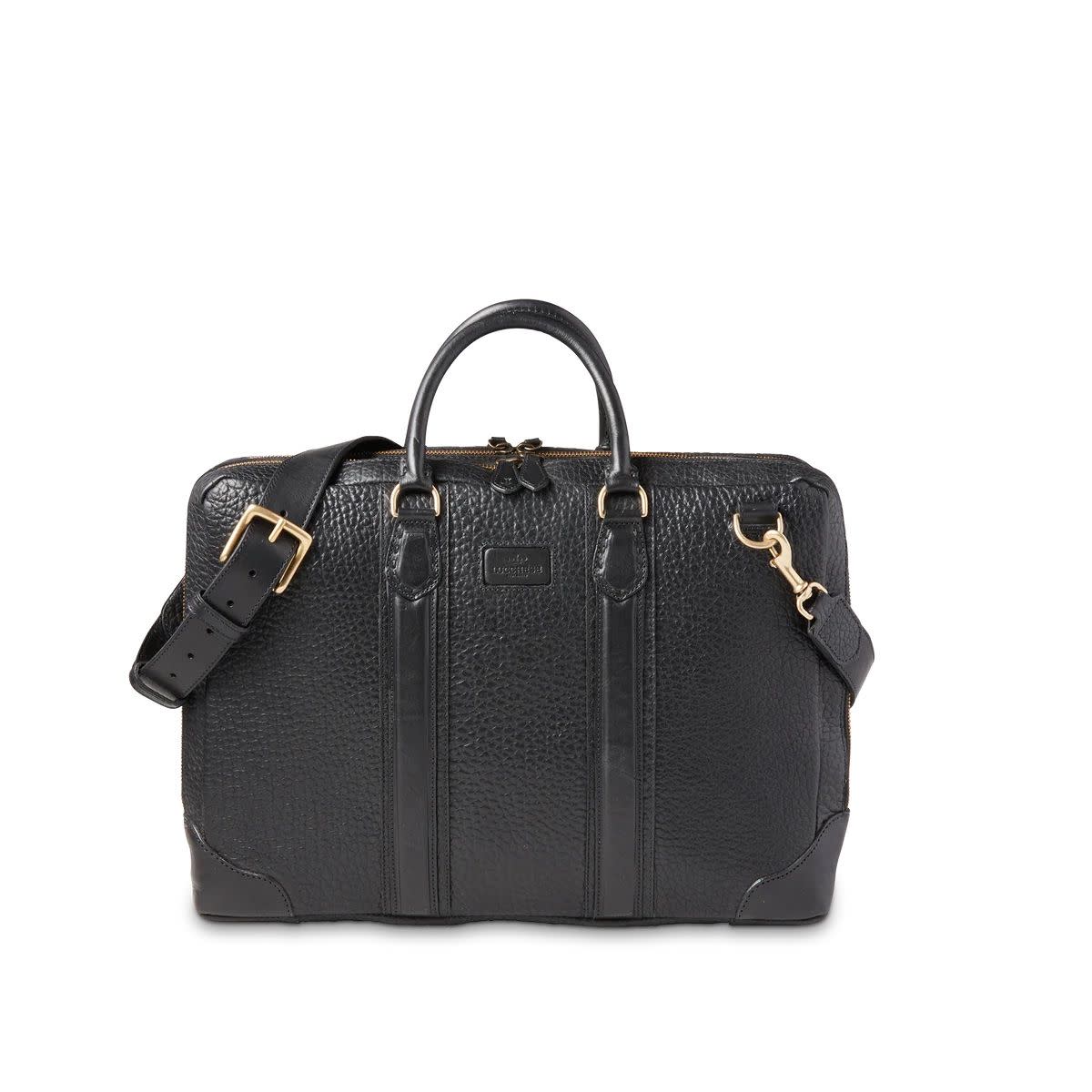 <p><a href="https://go.redirectingat.com?id=74968X1596630&url=https%3A%2F%2Fwww.lucchese.com%2Fproducts%2Feveryday-briefcase-black&sref=https%3A%2F%2Fwww.esquire.com%2Fstyle%2Fmens-accessories%2Fg28122227%2Flaptop-bags-for-men%2F" rel="nofollow noopener" target="_blank" data-ylk="slk:Shop Now;elm:context_link;itc:0;sec:content-canvas" class="link rapid-noclick-resp">Shop Now</a></p><p>Briefcase</p><p>$445.00</p>