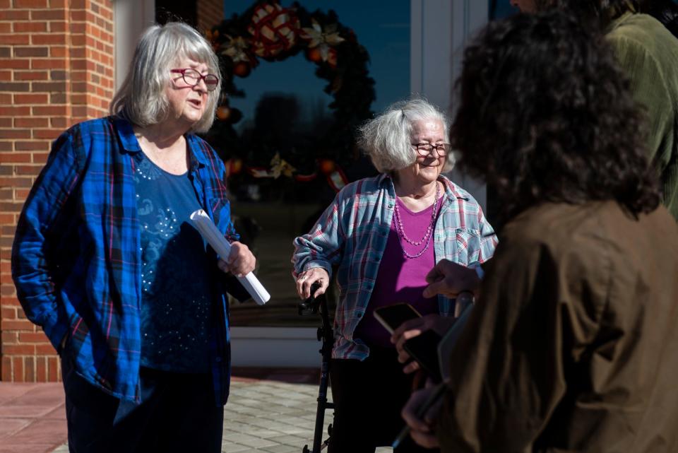 Uniontown residents and activist Ellis Long and Mary Schaeffer talk to media during a protest outside Alabama Department of Environmental Management in Montgomery, Ala., on Thursday, Dec. 15, 2022.