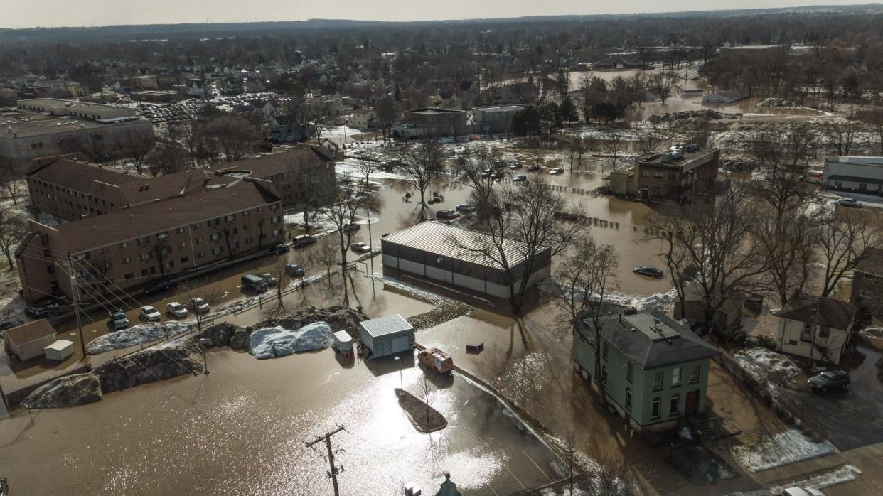 Ice jams caused water to spill over the shores of the Fond du Lac River on Thursday, March 14. Western Avenue west of the Fond du Lac County Sheriff's Office is pictured at around 11 a.m.