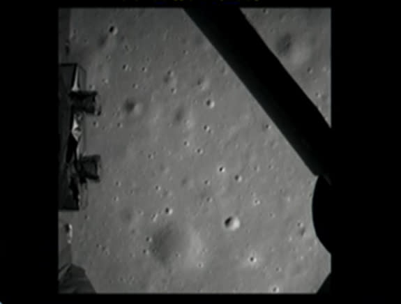 The first photo of the moon by China's Chang'e 3 lunar lander is shown here in this still from a broadcast by the country's state-run CNTV news channel on Dec. 14, 2013. Chang'e 3 delivered the Yutu rover to the moon with its successful landing