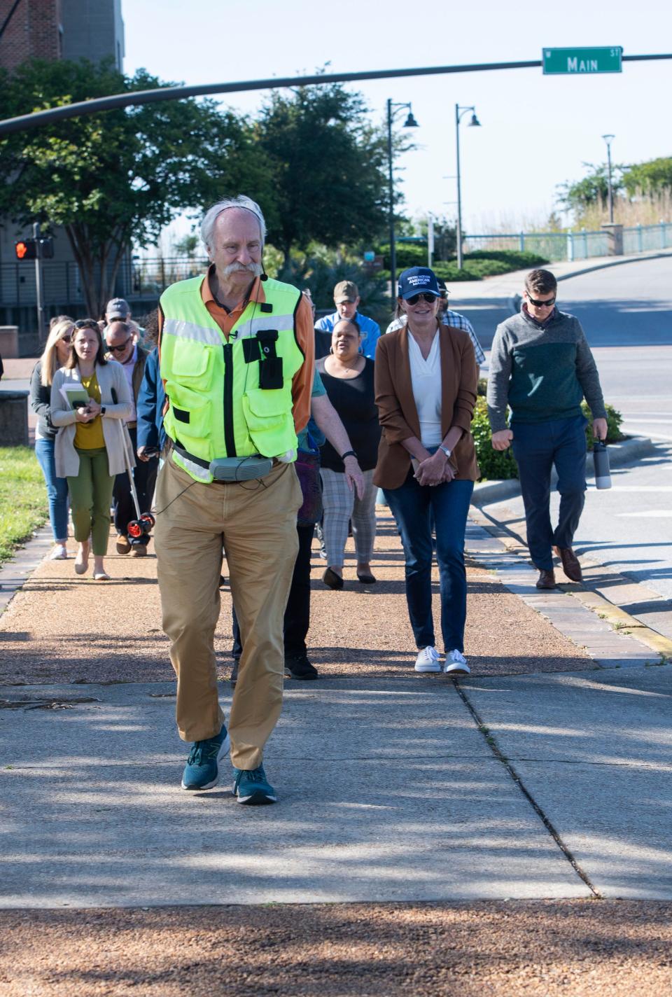 Walkability expert Dan Burden enlists a group of volunteers on a "walking audit" of downtown Pensacola on Monday, April 17, 2023. Burden discussed ways of improving street safety and the area's walking and biking infrastructure during a CivicCon event in Brownsville.