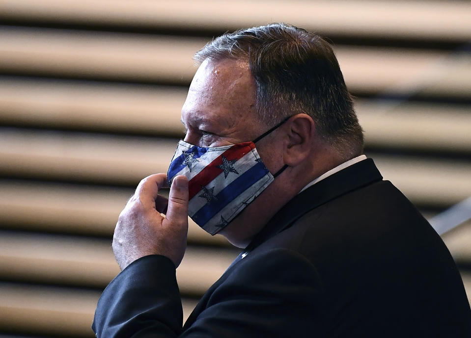 U.S. Secretary of State Mike Pompeo leaves the prime minister's office following a meeting in Tokyo, Tuesday 6, 2020. (Charly Triballeau/Pool Photo via AP)