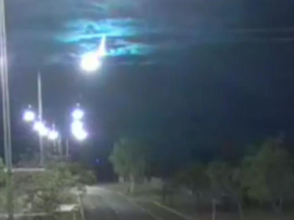 A meteorite that from the sky in Central Australia was filmed by police CCTV cameras.The giant space rock can be seen shooting across the skyline, near Alice Springs just after midnight on Monday. The night sky lit up in a bright blue glow, followed quickly by a dashing white light as the meteorite hit the ground.Members of the public in the Northern Territory had called the police reporting the flash and noise and officers in the area later discovered their CCTV cameras had filmed the incident. Officers were dubious of the initial reports from the public, Superintendent James O’Brien told ABC News, "but then we started looking around our CCTV and the one in Tennant Creek sees this beautiful purple light coming down.”The security footage captured the meteor shower scattering across the sky near Alice Springs. It is not known where the meteorite landed.