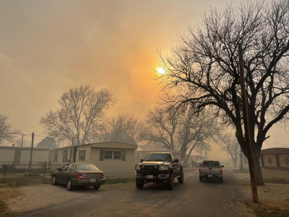 Residents of Chapel Hill mobile home park west of Abilene were being evacuated because of a large wildfire on both sides of Old Highway 80.