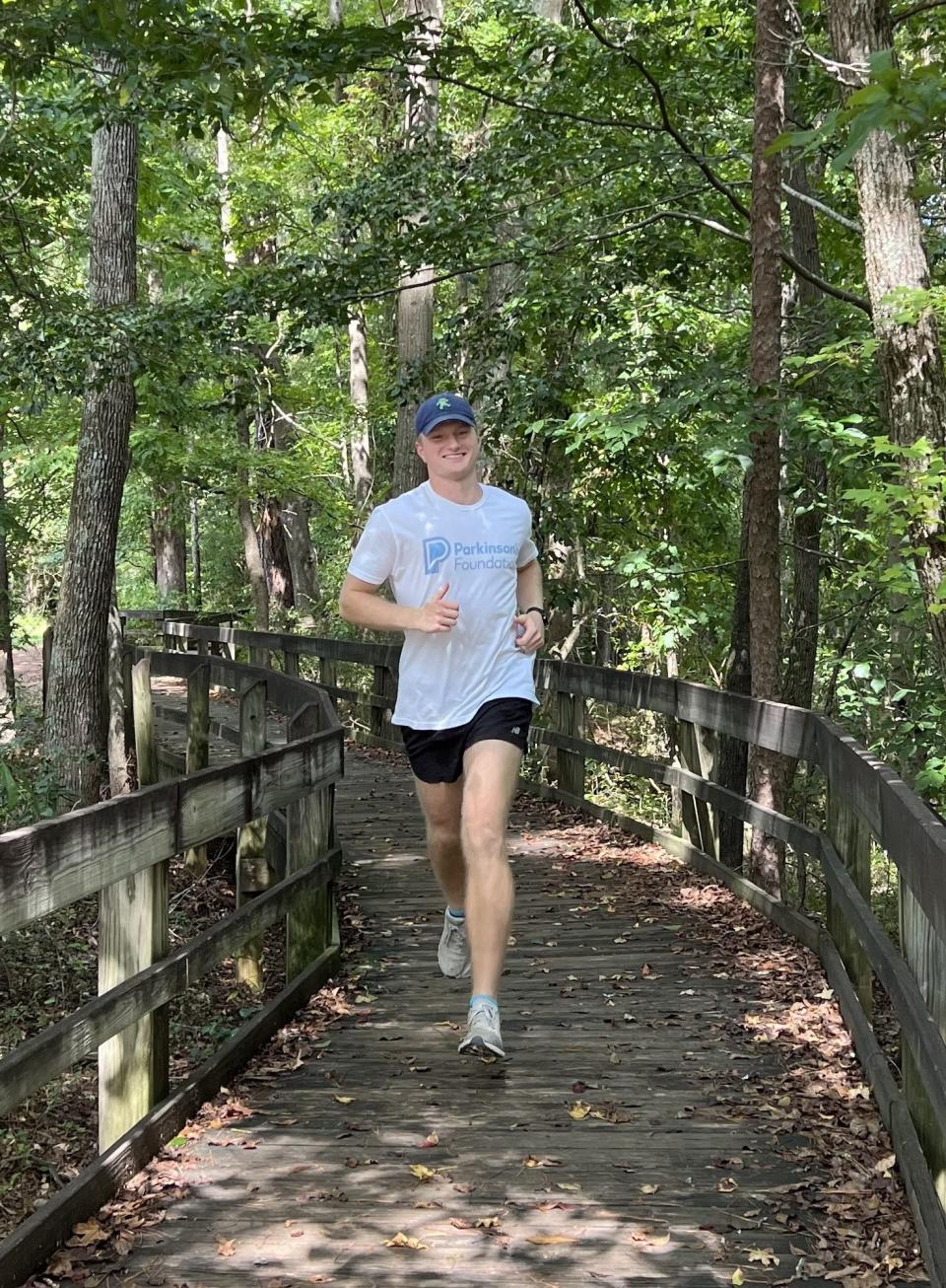 University of Georgia senior Christian Spence will run in an ultramarathon, a race about 31 miles long, on Dec. 16-17, 2023, as a fundraiser for Parkinson's Disease research and to honor his father, who has the disease.