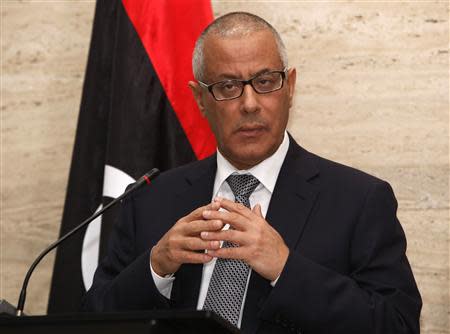 Libya's Prime Minister Ali Zeidan speaks during a news conference in Tripoli March 8, 2014. REUTERS/Ismail Zitouny