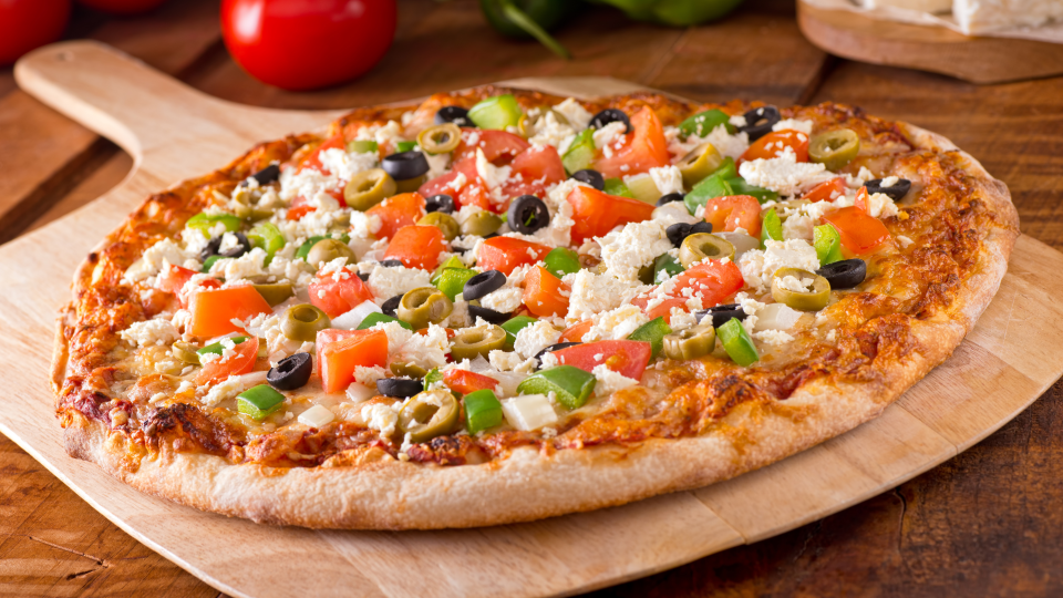 Greek pizza crust is spongy and usually pretty oily, too.