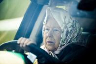 <p>At the annual Royal Windsor Horse Show, the Queen arrived wearing a floral headscarf, driving her signature Range Rover. </p>