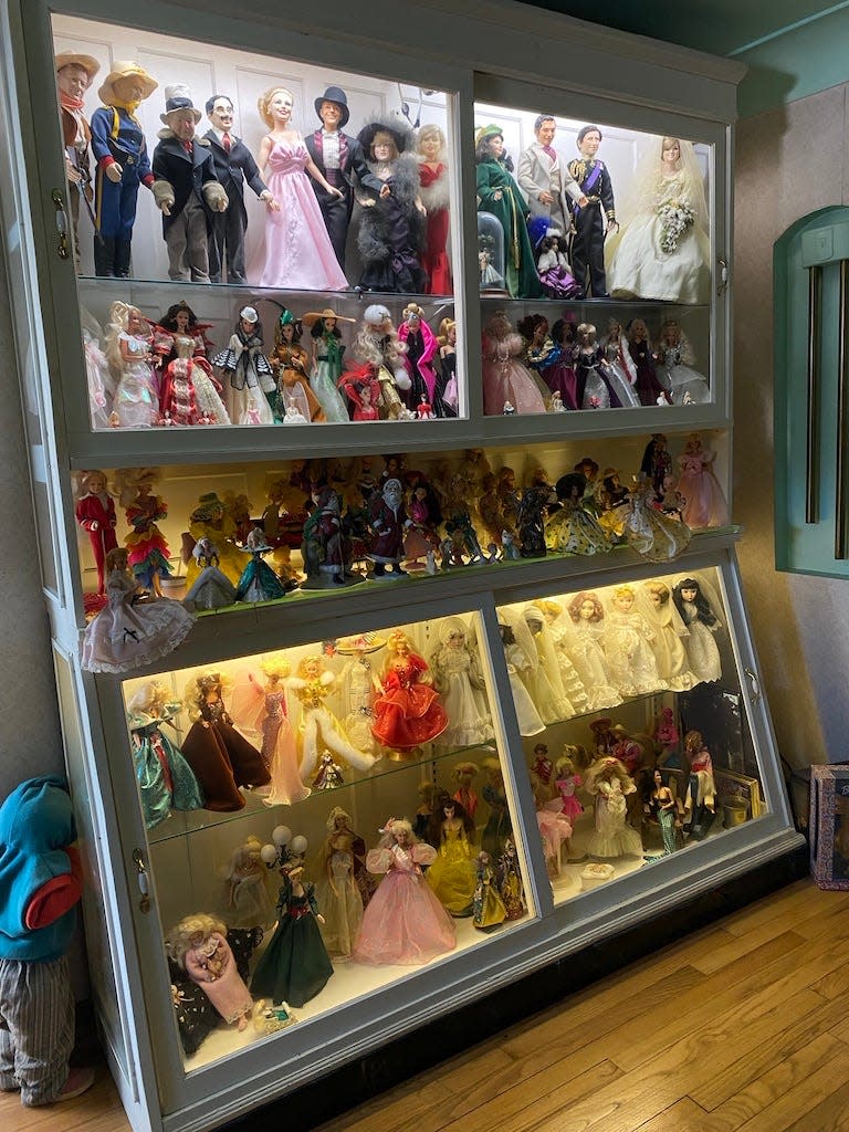 Some of the more than 100 dolls that the late Ruth Chase had in her collection. Her daughter, Paula Klawender, has donated 57 of the dolls to the Center for Active Adults in South Lyon, which will auction them.