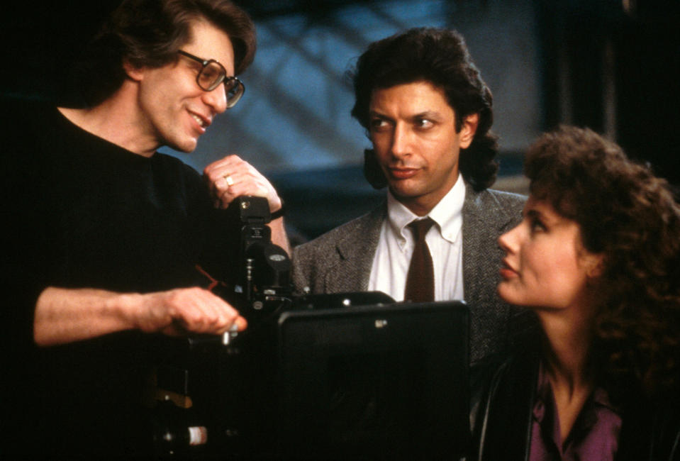 From left: Director David Cronenberg, Jeff Goldblum, and Geena Davis on the set of The Fly in 1986
